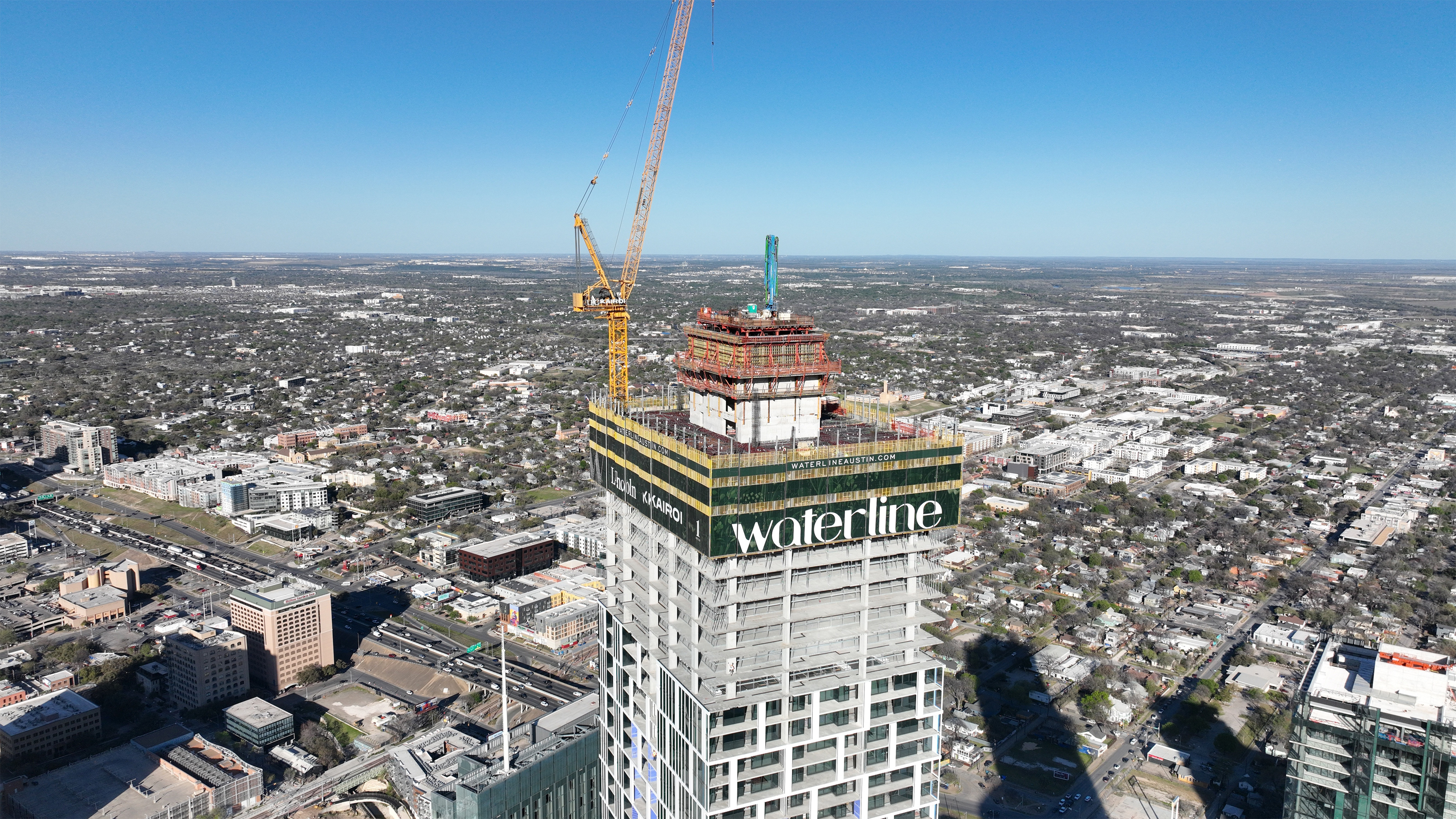 A building under construction with a Waterline sign